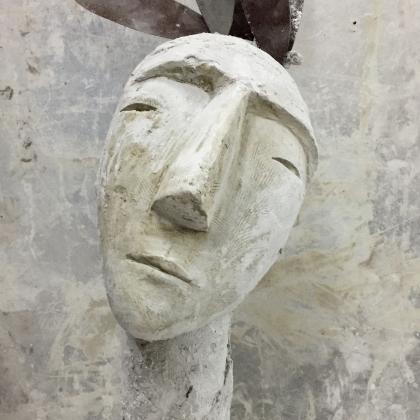 white sculpture / face