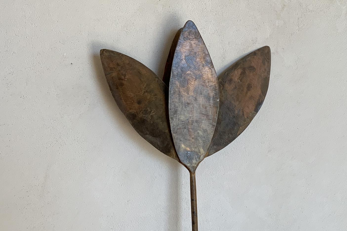 fossil garden. handmade metal flower